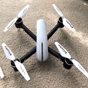 A medium sized drone white and black easy to use